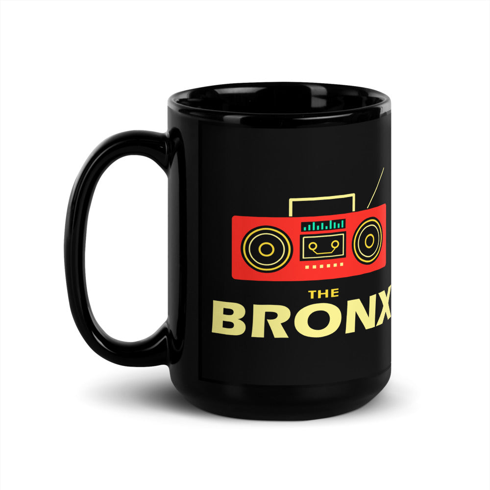 The Bronx — black mug, 15 oz, left side, logo on both sides