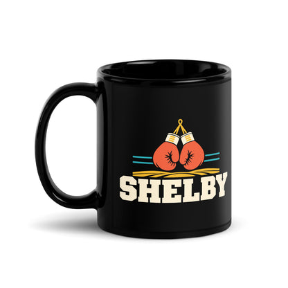 Shelby — black mug, 11 oz, left side, logo on both sides