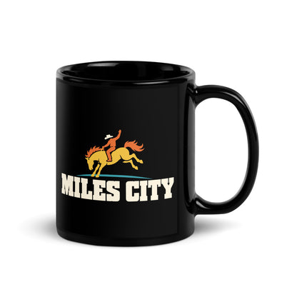 Miles City — black mug, 11 oz, right side, logo on both sides