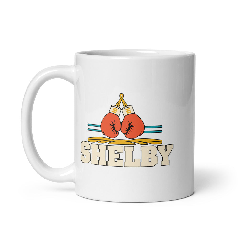 Shelby — white mug, 11 oz, left side, logo on both sides